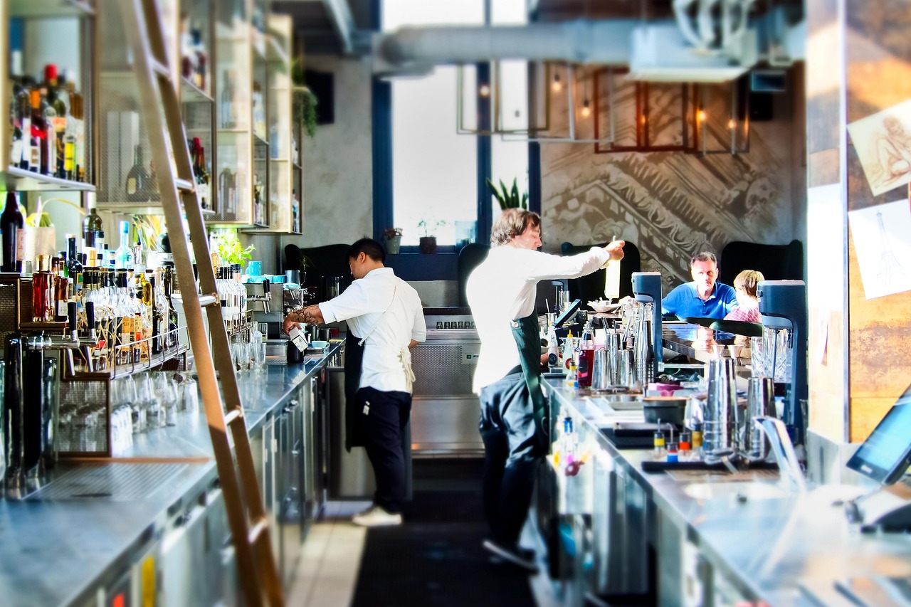 Modern hotel bar with bartenders preparing drinks — No. 1 Globe Vista hotel booking
