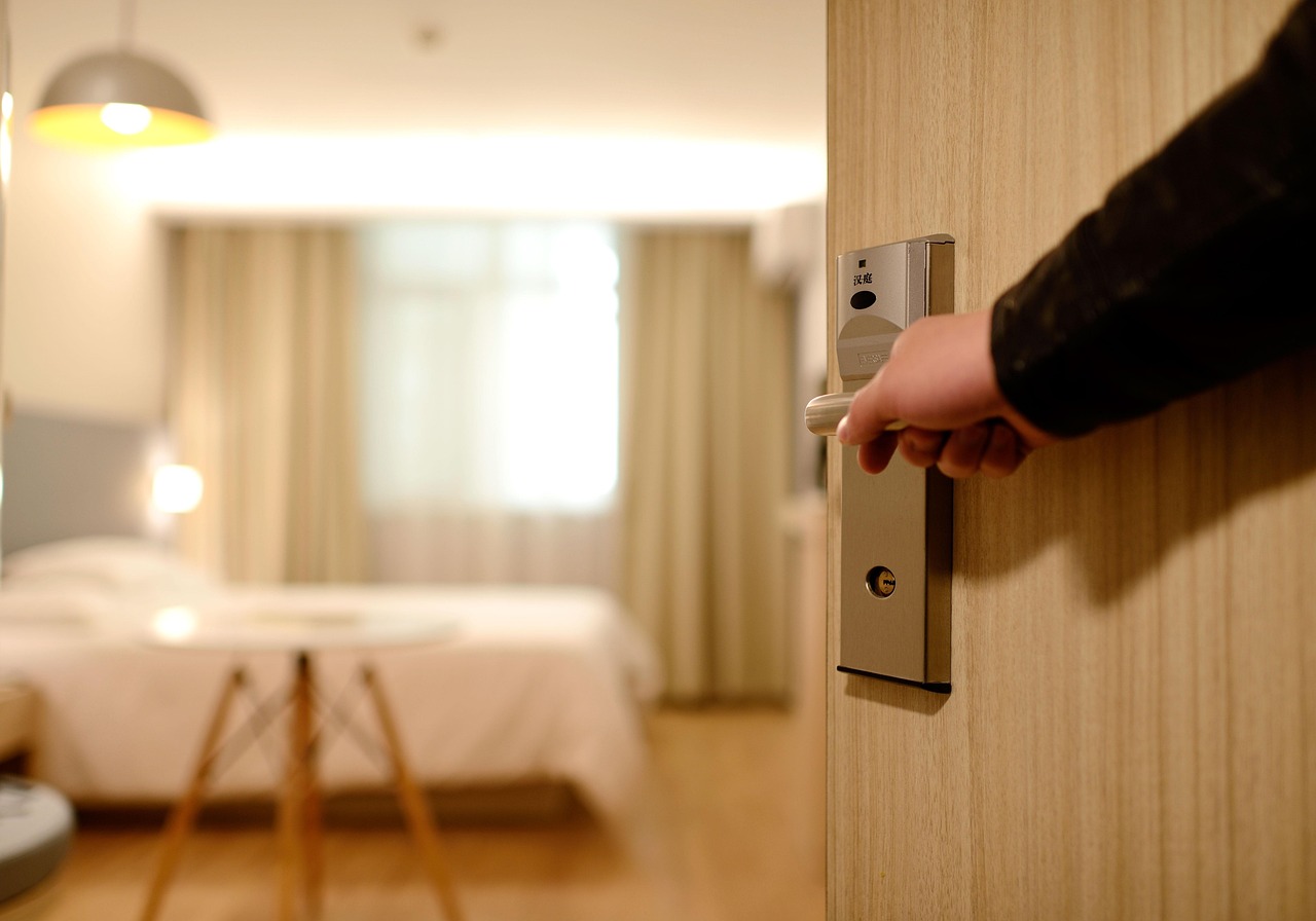 Guest entering a modern hotel room — No. 1 Globe Vista makes booking easy and fast